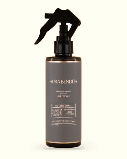 Golden Coast, aromatizante para auto de 200 ml de Aura Bendita: frasco sobre fondo marfil