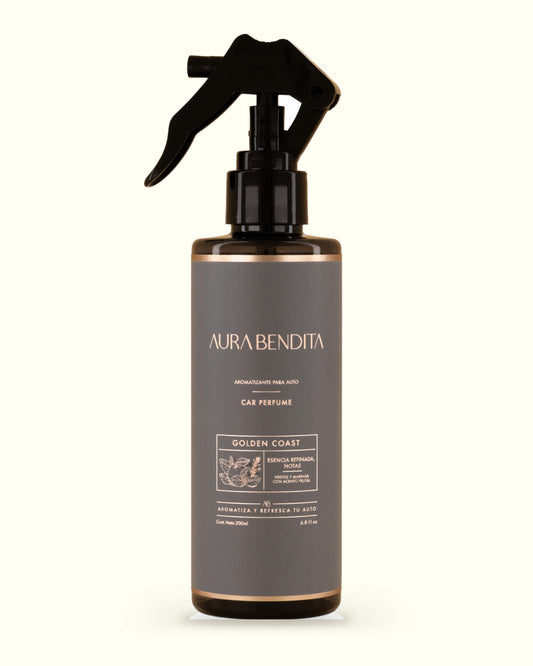 Golden Coast, aromatizante para auto de 200 ml de Aura Bendita: frasco sobre fondo marfil