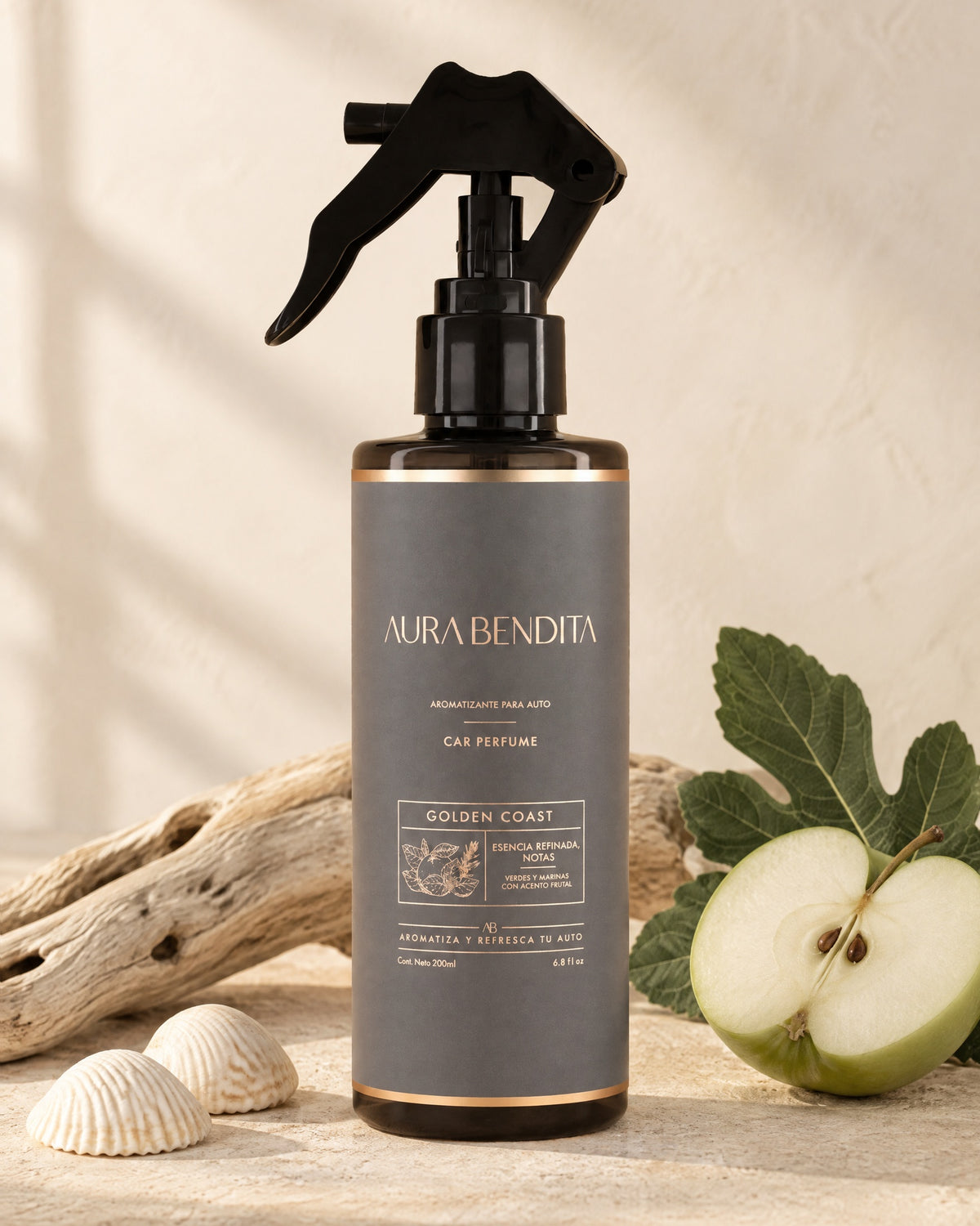 Golden Coast, aromatizante para auto de 200 ml, junto a elementos de su aroma